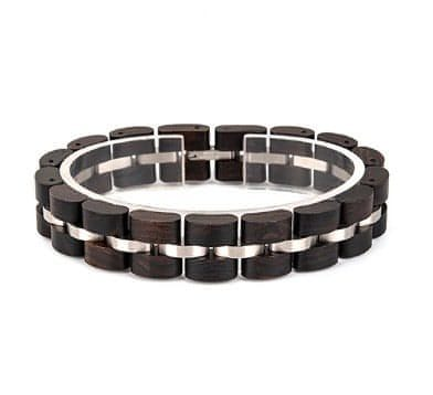 Ett unikt, ekologiskt, handgjort armband av naturmaterial. Rostrfitt stål och Ebonyträ.